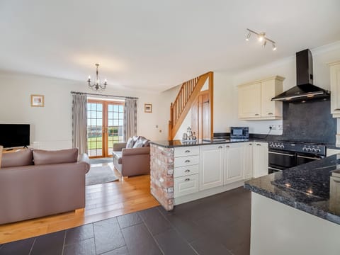 Open plan living space | Daflod - Parc Wernol Cottages, Chwilog, near Pwllheli
