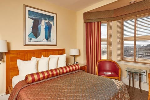 Wake up to sunshine and city views from bed.