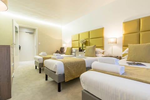 Get a good night's rest in the cozy bedroom, which has 3 Single beds.