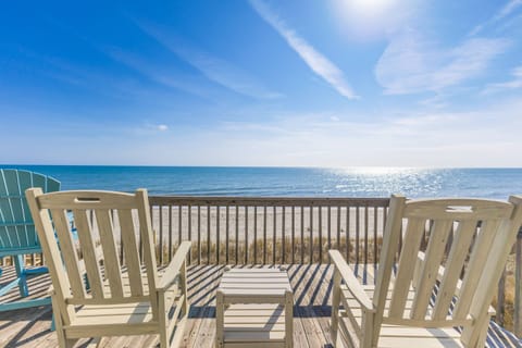 Plenty of seating with breathtaking beach and ocean views from the deck—perfect for relaxing and taking it all in!
