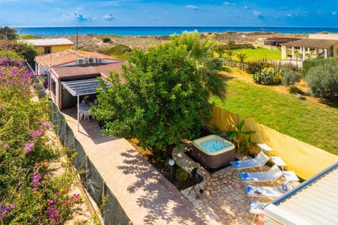 Beautiful villa with private terrace, jacuzzi, and beach access