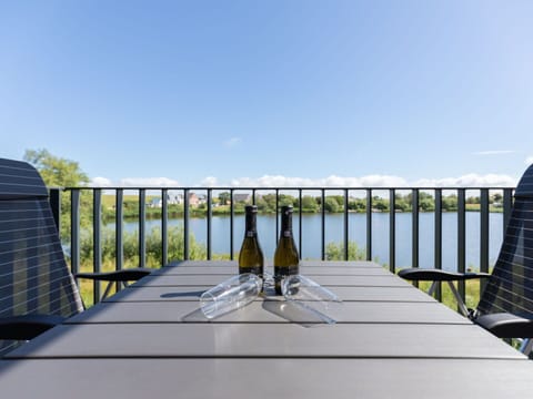 Sky, Shade, Land Lot, Cottage, Siding, Facade, Residential Area, Landscape, Roof, Grass