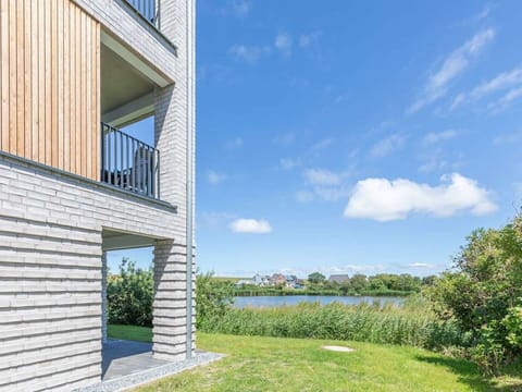 Sky, Shade, Land Lot, Cottage, Siding, Facade, Residential Area, Landscape, Roof, Grass