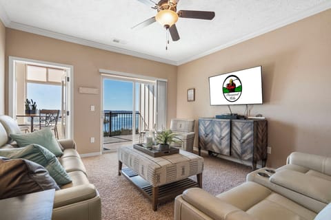 Living Area with Reclining Loveseat and Reclining Sofa, Cable TV, Sunroom Access,  2 Queen Air Mattresses for Extra Guests