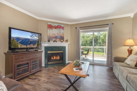 Spacious Living Room with Gas Fireplace, Sleeper Sofa and SMART TV with Cable & WIFI throughout vacation rental