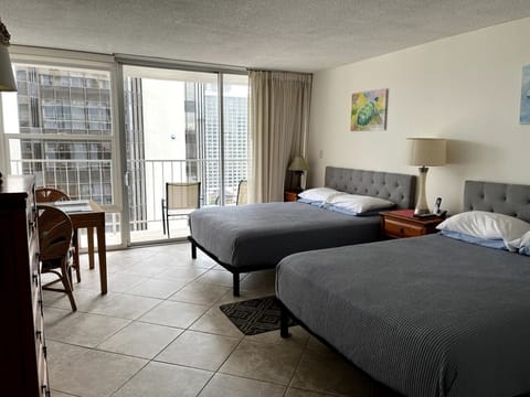 Two queen beds with new mattresses (2022).  

Open and airy room.