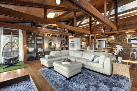 Curl up in the serene living room & stream all your favorite entertainment