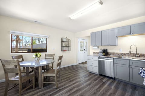 The 1st of 2 full kitchens offers ample space & all the comforts of home
