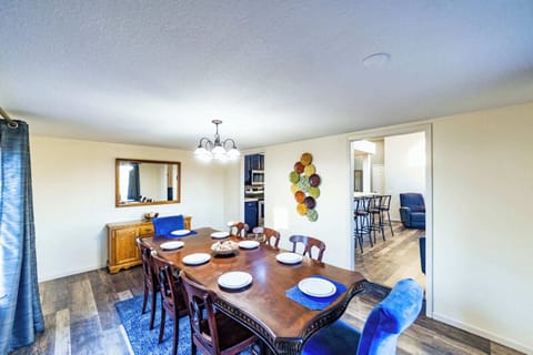 Gather for meals together at the dining table, with seating for 8