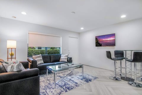 Open living space with plenty of seating to enjoy a night of entertainment