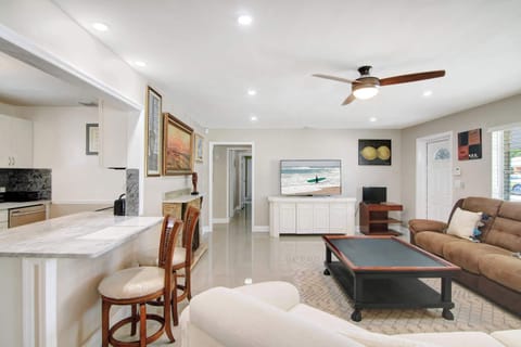 Cozy and spacious living area with TV