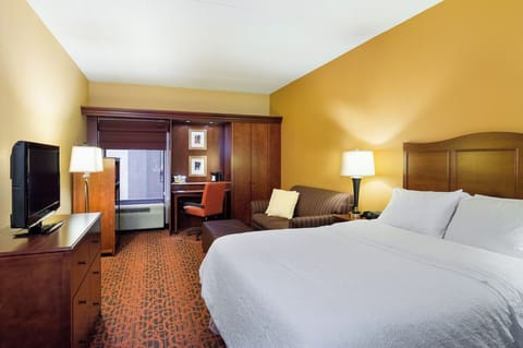 Unwind on the plush bed after a day out.