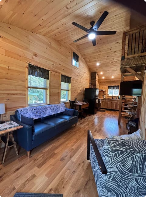 Relax in this cozy open floor plan living room while watching TV or reading.