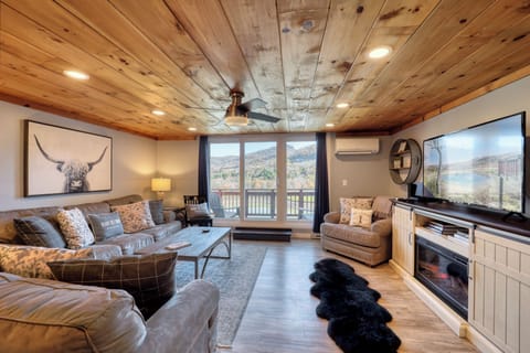 Luxury living that is near slopes with mountain and water views