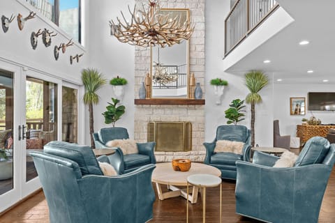 Gather around the cozy wood-burning fireplace in the living room, the true heart of the home. This inviting space is perfect for relaxing with loved ones after a day of adventure, with comfortable seating and a warm, welcoming atmosphere.