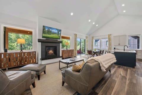 Open, airy, and filled with natural light—perfect flow from kitchen to dining to living room.