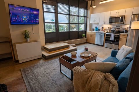 Living room with comfortable seating and warm lighting