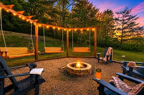 Gather around the glowing fire pit under a dreamy Smoky Mountain twilight sky — the perfect spot for cozy evenings, stories, and unforgettable memories.