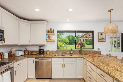 kitchen is clean, open and fully stocked with all your cooking needs