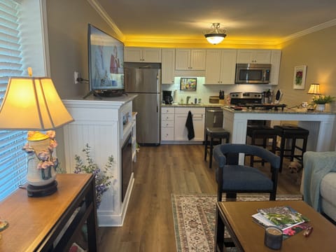 Cozy living room and kitchen perfect for a much needed getaway!