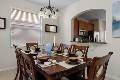 Gather around for memorable meals in this beautifully set dining space!