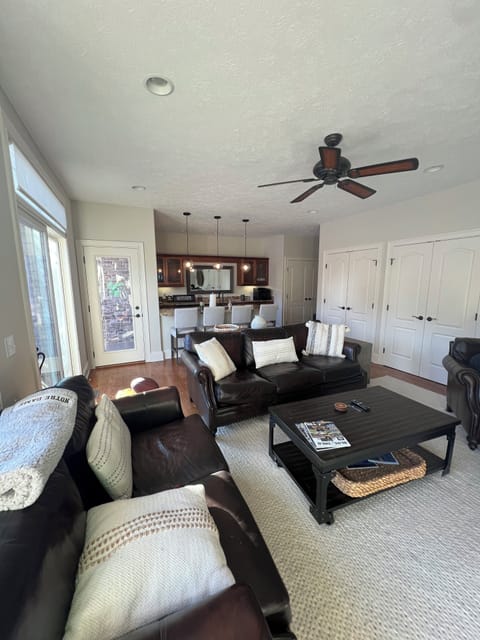 Family room 2nd floor with TV, Sonos, wet bar and deck