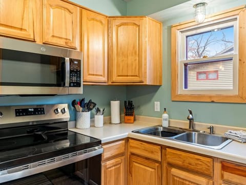 Modern kitchen with high-end appliances ideal for cooking family meals.