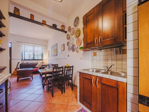 Furniture, Cabinetry, Property, Countertop, Wood, Sink, Chair, Kitchen Sink, Tap, Interior Design