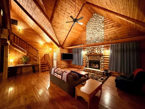 Living Room w Lofted Wood Beam Ceilings