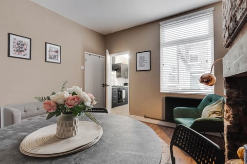 Separate dining area perfect for enjoying a home-cooked meal with family, friends, or colleagues. Picture yourself gathering around the table, sharing great food and even better conversation after a day exploring or working.