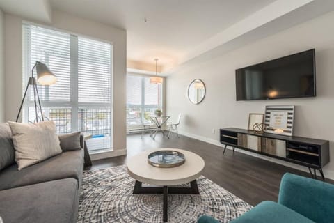 Bright living room with city views and modern comfort