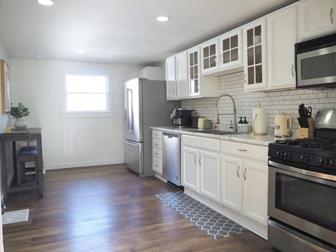 Bright kitchen with modern appliances and generous counter space.