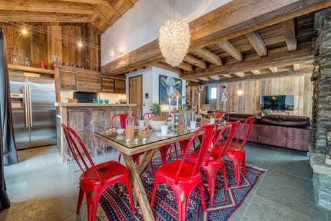 Prepare a delicious meal in the kitchen before enjoying it at the dining table.