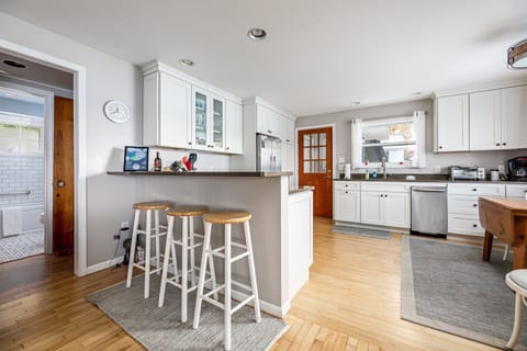 This beautiful kitchen is just one of the many features of this lovely home.