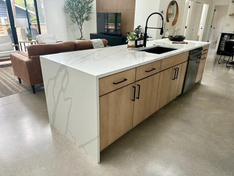 The well-stocked, open-plan kitchen means everyone can help with meal prep