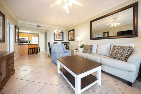 Unwind in the inviting living area, featuring comfortable seating and a dining space for shared meals and relaxation