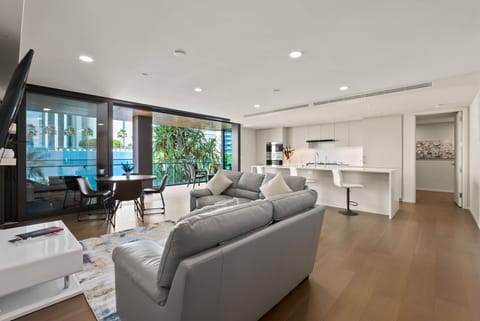 Bright, open living area blending comfort and elegance, with scenic views.