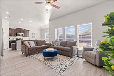 Living Room: Bright and airy space with inviting seating and a stylish, central table for gatherings!