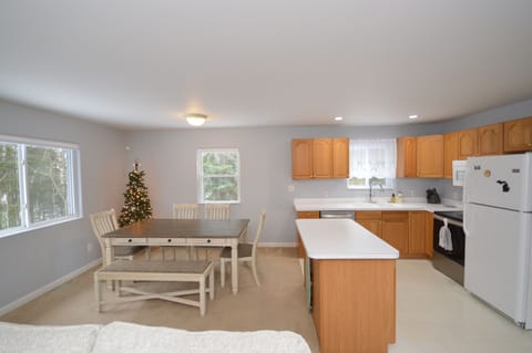 Open dining and kitchen space.