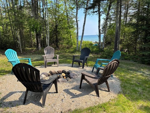 Firepit in private front yard with beautiful views of Lake Huron.
