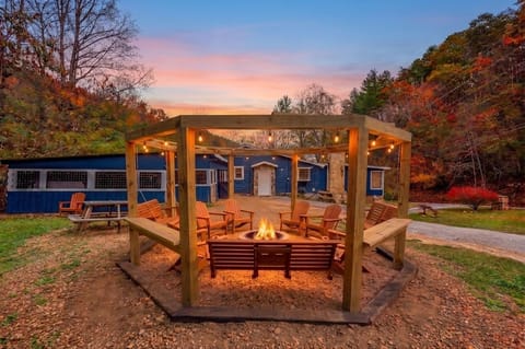 Cozy fire pit lounge with string lights