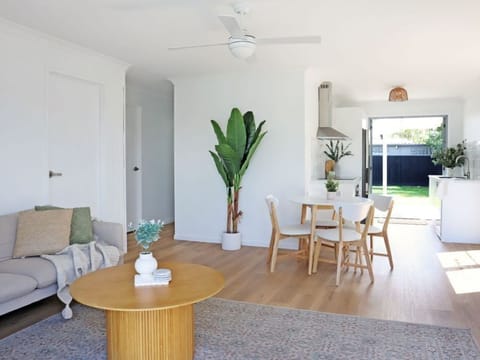 This Bright, airy living space with open-plan design is perfect for relaxing.