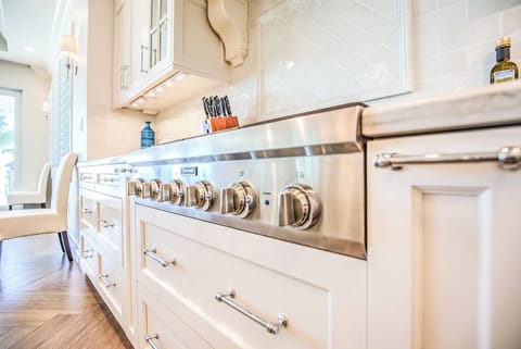 You will find the Chefs Kitchen to be fully equipped with Thermador appliances including a 6-burner gas cooktop, 2 dishwashers, wall oven, warming drawer, subzero refrigerator, food processor, Vitamix, rice cooker, electric skillet, and much more.