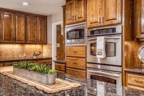 Double oven with inset microwave.