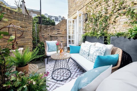 Relax in the Pembrokes's charming private garden patio.