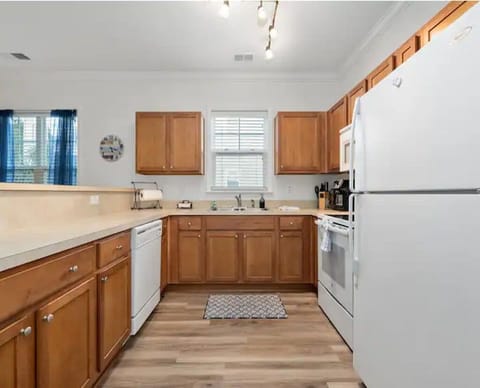 Cook up your favorite meals in this modern kitchen.