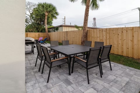 Patio table and chairs setting for eight for alfresco dining