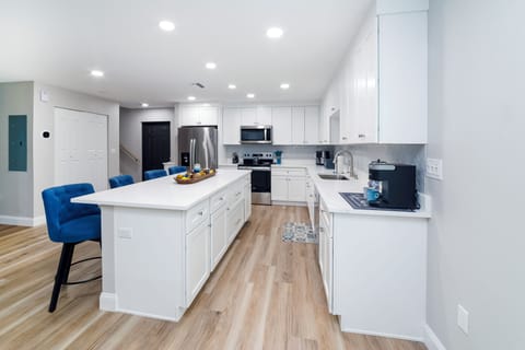 4 bar stools at the island.