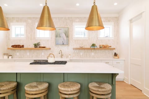 36" downdraft gas cooktop. Our fully stocked kitchen is an entertainer's dream!