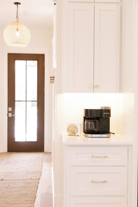 The coffee station - located next to the kitchen fridge.